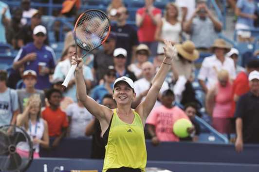 Simona Halep of Romania celebrates after defeating Sloane Stephens in the semi-finals in Mason, Ohio, on Saturday. (AFP)