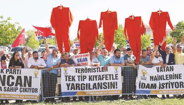 People protest against soldiers who participated in last yearu2019s attempted coup as they arrive for their trial at Sincan Penal Institution near Ankara.