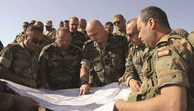 Lebanese Army Commander Joseph Aoun speaks to soldiers in Ras Baalbek during an operation against Islamic State extremists.