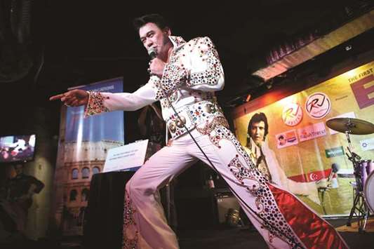 Jun Espinosa of the Philippines during the finals of the first annual Elvis Asia contest in Manila.