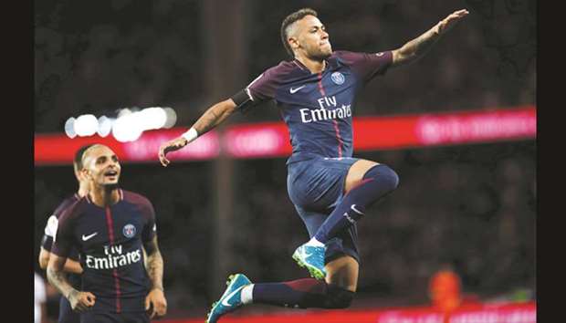 Paris Saint-Germainu2019s Neymar celebrates scoring against Toulouse during the Ligue 1 match in Paris, France.