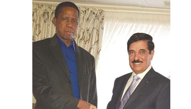 HE Dr Hamad bin Abdulaziz al-Kuwari shaking hands with Zambian President Edgar Lungu in Lusaka.