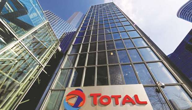 A view of Total Tower, the headquarters of French oil giant Total, at La Defense business and financial district in Courbevoie near Paris. Total expects the Maersk Oil deal, its biggest oil deal since it acquired Elf in 2000 to generate financial synergies of more than $400mn per year, in particular by combining assets in the North Sea.