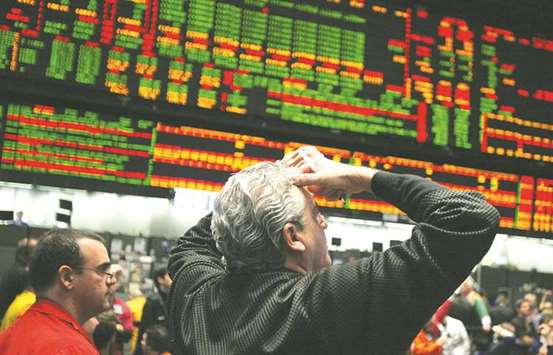 Traders work in the S&P 500 pit at the CME Groupu2019s Chicago Board of Trade in Illinois. CME, the worldu2019s biggest exchange operator by market value, is looking to the lucrative business of selling data to boost revenue, spawn new financial products, and change the way many futures contracts trade.