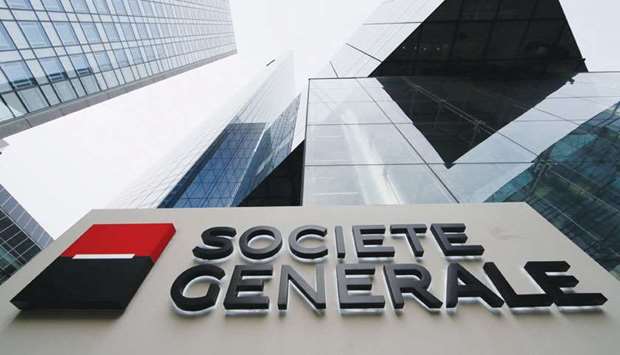 Shares in Societe Generale slid yesterday after revealing that its second-quarter net profits tumbled on the cost of settling a lawsuit with Libyau2019s sovereign wealth fund.