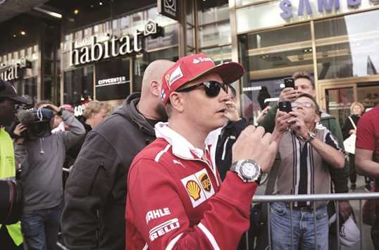 Ferrari driver Kimi Raikkonen arrives for a media conference in Helsinki, Finland, yesterday. (Reuters)