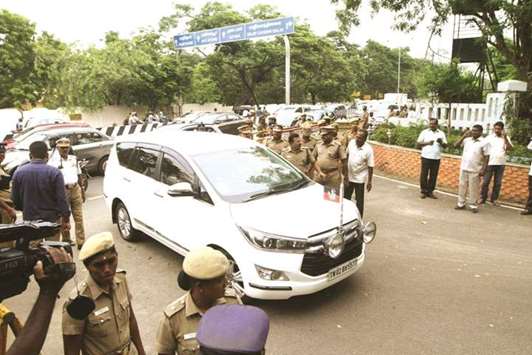 Police are deployed as AIADMK deputy general secretary T T V Dinakaran arrives to meet Tamil Nadu Governor C V Rao at Raj Bhavan in Chennai yesterday.
