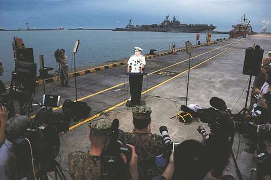 Admiral Scott Swift, Commander of the US Pacific Fleet, speaks at a news conference near the damaged USS John McCain and the USS America at Changi Naval Base in Singapore yesterday.