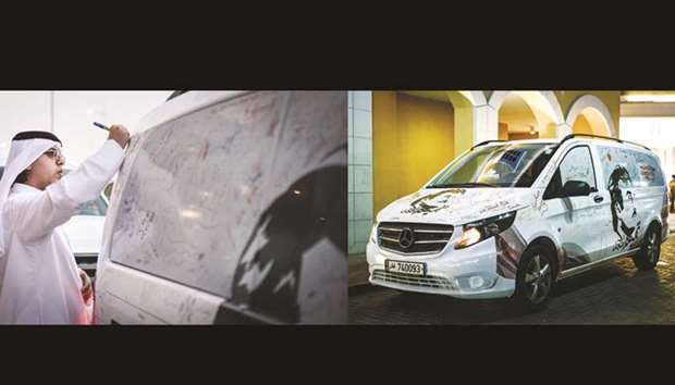 A Qatari writes a message of love, loyalty and patriotism on a bespoke mobile billboard. RIGHT: A Mercedes-Benz vehicle used as a bespoke mobile u2018billboardu2019.