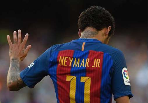 This file photo shows Barcelonau2019s Brazilian forward Neymar gesturing during the Spanish league match against Villarreal at the Camp Nou stadium in Barcelona.
