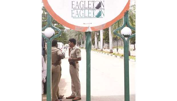 Police guard the Eagleton Resort where Income Tax officials carried out raids in Bengaluru yesterday.