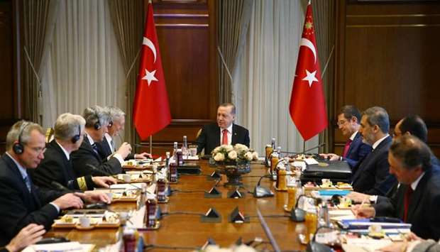 Recep Tayyip Erdogan (C) receiving US Secretary of Defense, James Mattis (C,L) within an inter-delegation meeting at the Presidential Complex in Ankara