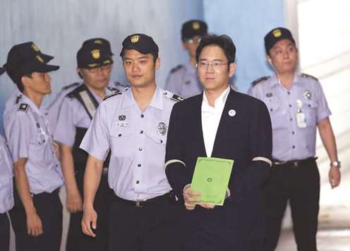 Lee Jae-yong, vice chairman of Samsung Electronics, arrives for his trial at the Seoul Central District Court (file). Lee has been detained during his trial, and the prospect of his being imprisoned for years has sent shockwaves through Samsung, where the founding familyu2019s rule has been taken for granted for decades.