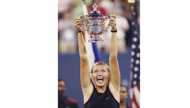This September 9, 2006 photo shows Maria Sharapova with the 2006 US Open trophy.