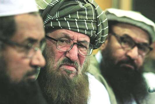 Maulana Sami-ul-Haq (centre), a Pakistani cleric and head of Darul Uloom Haqqania, an Islamic seminary, is seen during a news conference with other leaders in Islamabad yesterday.