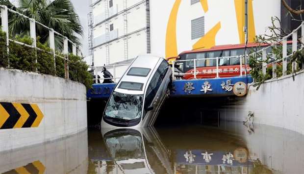 A vehicle damaged by Typhoon Hato is seen in Macau