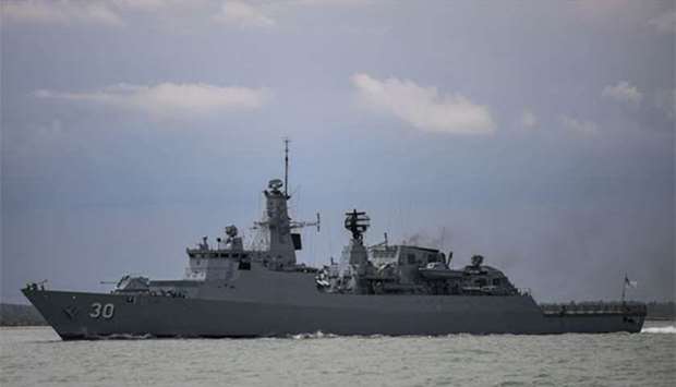 A Royal Malaysian Navy warship ,KD Lekui, takes part in the rescue operation for the missing sailors from the USS John S. McCain off the Johor coast of Malaysia on Thursday.