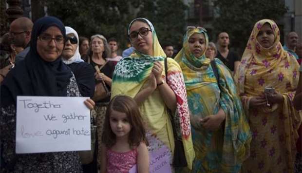 Muslims attend a demonstration in Granada on Wednesday in protest against a surge in anti-Islamic hate crimes following last week's deadly attacks in Barcelona and Cambrils.