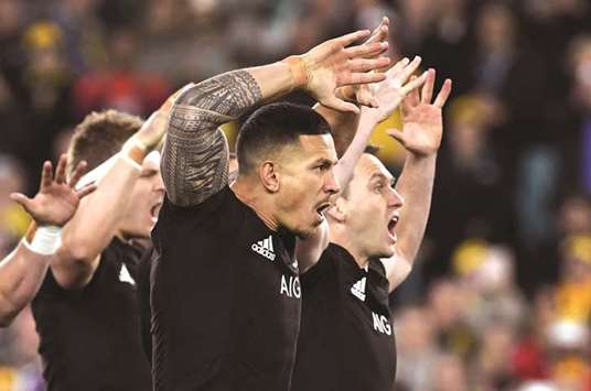 This photo taken on August 19, 2017 shows All Blacks centre Sonny Bill Williams (C) performing the haka with teammates Sam Cane (L) and Ben Smith (R) before their Rugby Championship Test match against the Australian Wallabies in Sydney. Williams will start in Dunedin tomorrow after showing no after effects from the head knock he took early the opening match against Australia, won by the All Blacks 54-34 in Sydney last weekend.