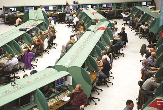 Traders working on the floor of the Borsa Istanbul, the Turkish stock exchange (file). Bellicose utterances out of Ankara and Berlinu2019s responses havenu2019t done much to pause the rally in Turkish stocks: the benchmark index has gained about 41% so far in 2017, making it one of the worldu2019s five best-performing markets as investors pursue enticing returns in emerging stock markets.