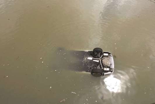 A vehicle is seen floating on the sea after Typhoon Hato hits Macau, China.