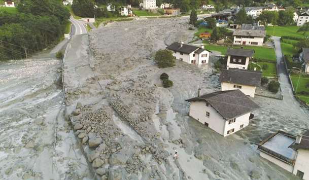 This aerial video grab made yesterday partially shows the Swiss village of Bondo after a landslide struck the day before, sending mud, rocks and dirt flooding down the Piz Cengalo mountain into the outskirts of the village, near the Italian border.