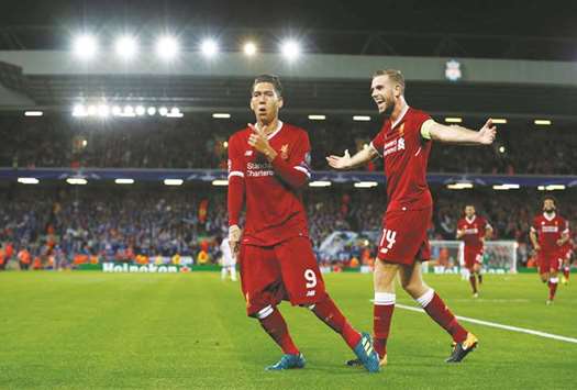Jurgen Kloppu2019s Liverpool side swept into the Champions League group stage for the first time in three years with a 4-2 win over Hoffenheim on Wednesday. Roberto Firmino (left) was also on the scoresheet on the night. (Reuters)