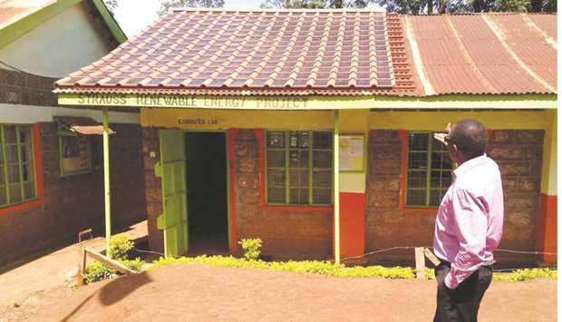 The computer lab at Gaitheri Secondary School has a roof covered in specially designed tiles that generate solar power. In Kenya, the tiles at Gaitheri school, which has 275 students, were made by Kenyan firm Strauss Energy and paid for with a grant from the US African Development Foundation.