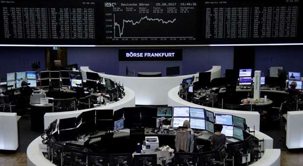 Traders at the Frankfurt Stock Exchange. The DAX 30 lost 0.1% to 12,167.94 points yesterday.