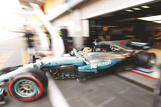 Mercedesu2019 Lewis Hamilton drives out of the pit garage during practice for the Belgian Grand Prix at Spa-Francorchamps, Belgium, yesterday. (Reuters)