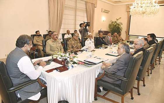 In this handout photograph released by Pakistanu2019s Press Information Department Pakistanu2019s Prime Minister Shahid Khaqan Abbasi heads a meeting of the National Security Committee in Islamabad.