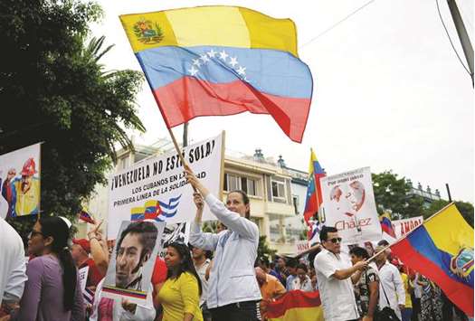 Cubans and Venezuelans living in Cuba take part in a march in solidarity with President Nicolas Maduro, yesterday in Havana.