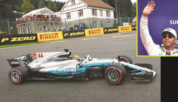 Mercedesu2019 Lewis Hamilton in action during the qualifying session at the Belgian Grand Prix in Spa-Francorchamps. (Reuters).  TOP RIGHT: Lewis Hamilton is is 14 points behind Ferrariu2019s Sebastian Vettel. (AFP)