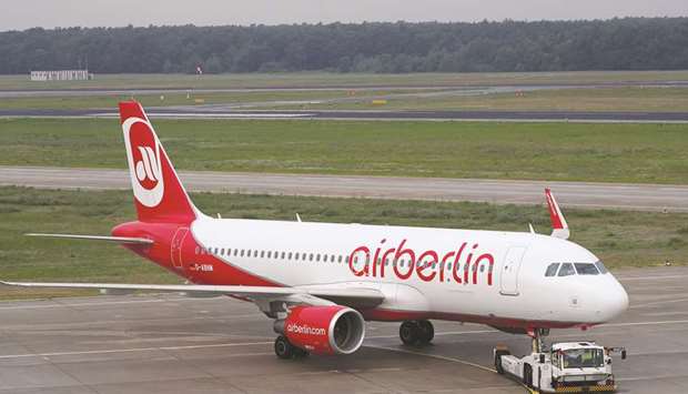 A passenger aircraft operated by Air Berlin lands at Tegel airport in Berlin. German Economy Minister Brigitte Zypries said she was surprised by criticism of the German governmentu2019s u20ac150mn bridging loan to keep Air Berlin flying, telling a news conference she expects the money to be repaid.