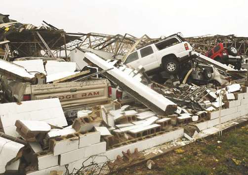 A destroyed building and vehicles at Rockport Airport after Hurricane Harvey hit Rockport, Texas yesterday.