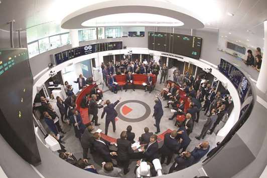 Traders react on the trading floor of the open outcry pit at the London Metal Exchange. The LME Index of six metals climbed to the highest since late 2014 last week, and is 18% higher this year after a 21% advance in 2016.