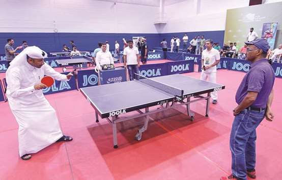 QTTA Board Member Thani al-Zarraa and Indian ambassador P Kumaran during their friendly match at the event.