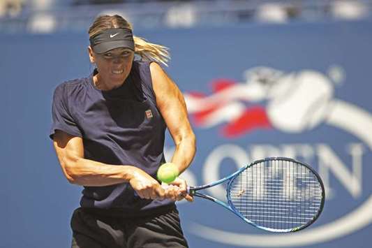 Maria Sharapova during a practice session ahead of US Open in New York yesterday. The Russian will face Simona Halep in round one. (AFP)