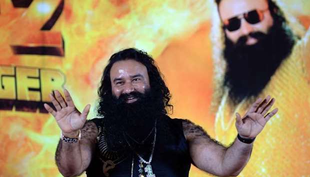 This file photo taken on September 8, 2015 shows Indian chief of the religious sect Dera Sacha Sauda (DSS) Gurmeet Ram Rahim Singh at a news conference.