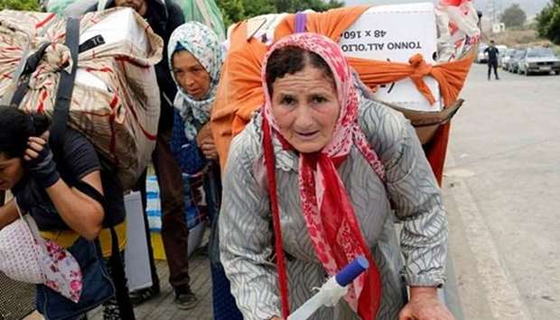 Moroccan women transporting goods across the border. Reuters file picture.
