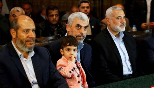 Hamas leader Ismail Haniyeh (right) and Hamas Gaza chief Yahya al-Sinwar (centre) attend a ceremony in Gaza City earlier this year.