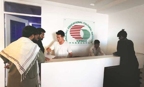 Pakistani men sign up for Chinese language classes at the China Pak Cultural Educational Institute in Islamabad, Pakistan June 9, 2017.