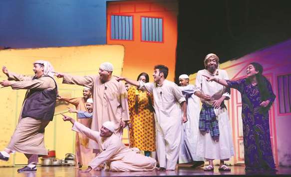 Performers of the Arabic play Khosheysha (Hide & Seek) on stage.