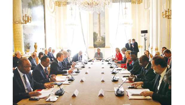 Macron chairs a meeting on migration across the Mediterranean Sea at the Elysee Palace in Paris yesterday. The leaders of France, Germany, Italy, and Spain met yesterday with counterparts from Libya, Niger, and Chad to discuss ways to curb illegal migration across the Mediterranean Sea to European shores.