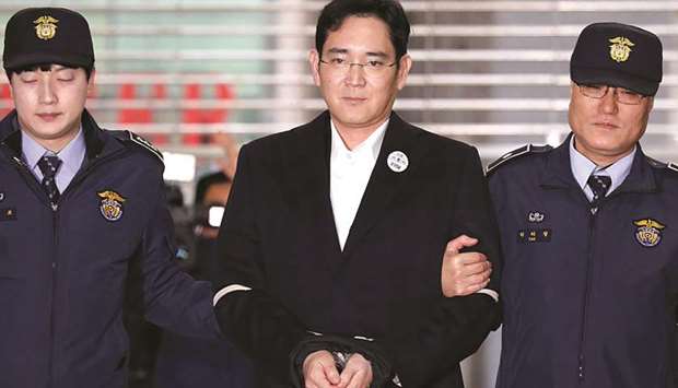 Samsung Group chief Jay Y Lee arrives at the office of the independent counsel team in Seoul (file). The sentencing of the billionaire scion was a watershed for South Koreau2019s decades-long economic order, which has been dominated by powerful, family-run conglomerates.