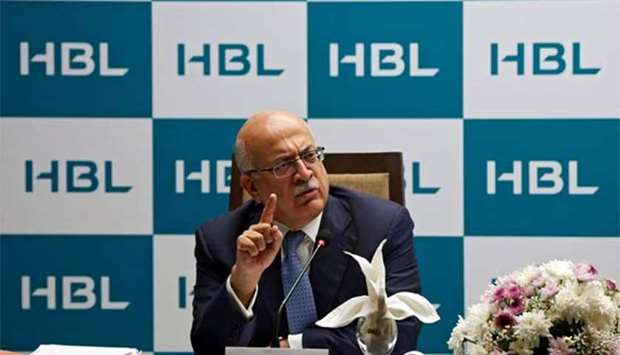Nauman K. Dar, President and Chief Executive Officer of the Habib Bank Limited (HBL) gestures during a news conference in Karachi on Tuesday.