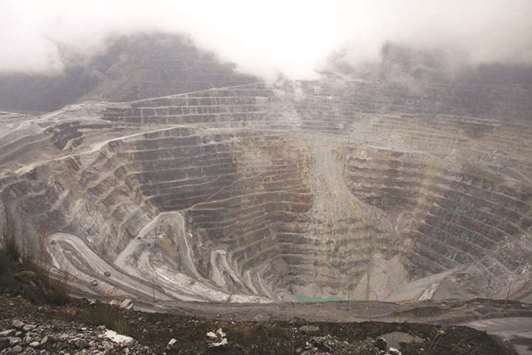 A general view of the Freeport McMoRanu2019s Grasberg mining complex, one of the worldu2019s biggest gold and copper mines located in Indonesiau2019s remote eastern Papua province. The US mining giant said yesterday it had agreed to divest a 51% stake in its Indonesian unit, bringing an end to a fierce standoff with the Indonesian government over mining rights.