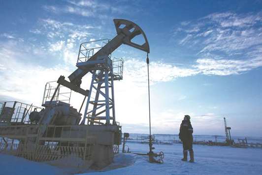 A worker inspects a pumping jack during oil drilling operations in an oilfield operated by Bashneft in Russia. The new restrictions cut the period that US-based entities can provide finance to Russian energy firms from 90 to 60 days and are part of a fresh package of US sanctions that US President Donald Trump approved on August 2.