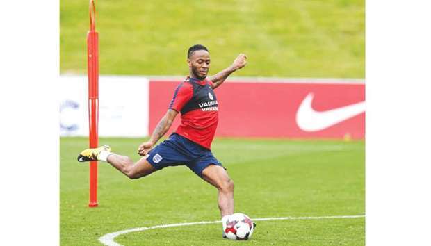 England midfielder Raheem Sterling attends a training session at St Georgeu2019s Park in Burton-on-Trent, ahead of team's 2018 World Cup qualifier matches against Malta tomorrow and Slovakia on September 4. (AFP)