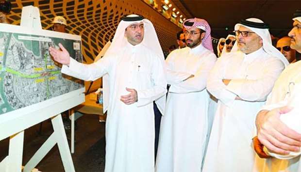 Ashghal's manager of roads operations and maintenance Senior Engineer Yousef el-Emadi (left) briefing dignitaries and other Ashghal officials on the features of the Pearl Interchange. PICTURE: Jayan Orma